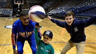Trick Shots With The Harlem Globetrotters | That's Amazing