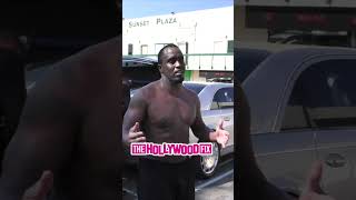 Diddy Gets Upset When Paparazzi Jumps Out On Him With No Shirt On While Leaving