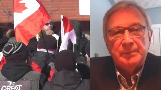 Protesters gather outside the home of N.B. Premier Higgs