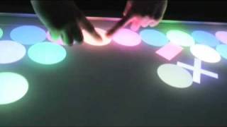 MT4j - Open Source Java Multitouch Framework - Example "Physics Playground"