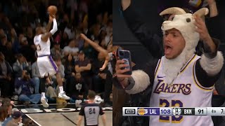 LeBron James hits insane 3 falling out of bounds and has Nets fans cheering 😱