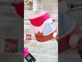 Painting a terracotta planter with Pink waves