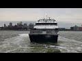 seastreak high speed ferry leaving wall st. nyc