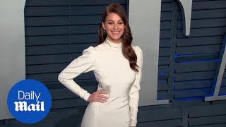 Camila Morrone walks the red carpet at Vanity Fair Oscar Party