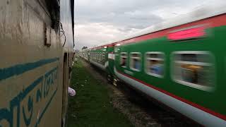 Brand New Suborno Express Train cross Upakul Train at Gangasagor Rail station. Bangladesh Railway.