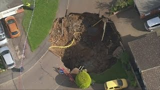 Huge sinkhole opens in the middle of a UK street