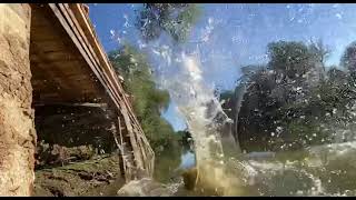 stone falling into water (in slow motion)
