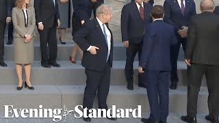 Boris Johnson snubbed by other leaders as he stands alone during NATO family photo