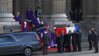 French ex-president Chirac's coffin arrives for church service | AFP