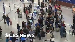 Hundreds of flights delayed as Americans continue holiday travel