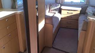 Elddis Crusader Superstorm 2012 6 Berth twin dinnet with rear pullover bunk beds.