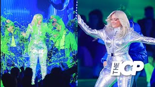 Bebe Rexha’s Jumpsuit Shimmers as She Gets Covered in Green Slime