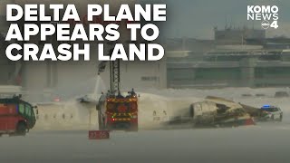 RAW VIDEO: Delta plane appears to crash land upside down at Toronto airport