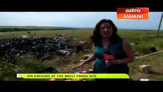 Exclusive - On ground at MH17 crash site