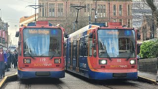 South Yorkshire Supertram Siemens Duwags 119 \u0026 110 arriving and Leaving Cathedral on the Blue route