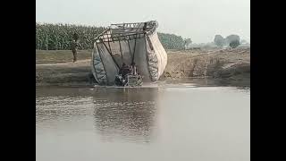 Tractor in River