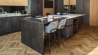 German Handleless Kitchen in concrete and textured warm timber tones