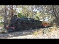 Don River Railway Steam locomotive M4 hauling a passenger train near Coles Beach