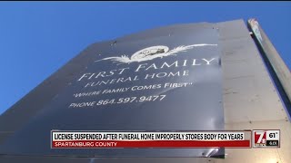 Funeral license suspended after body found stored for years