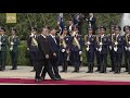 chinese president xi jinping inspects tajikistan honor guard