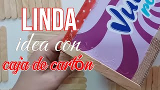 Linda IDEA con caja de cartón y palitos de madera