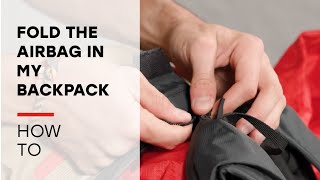 How do I fold the airbag in my ARVA airbag backpack ?