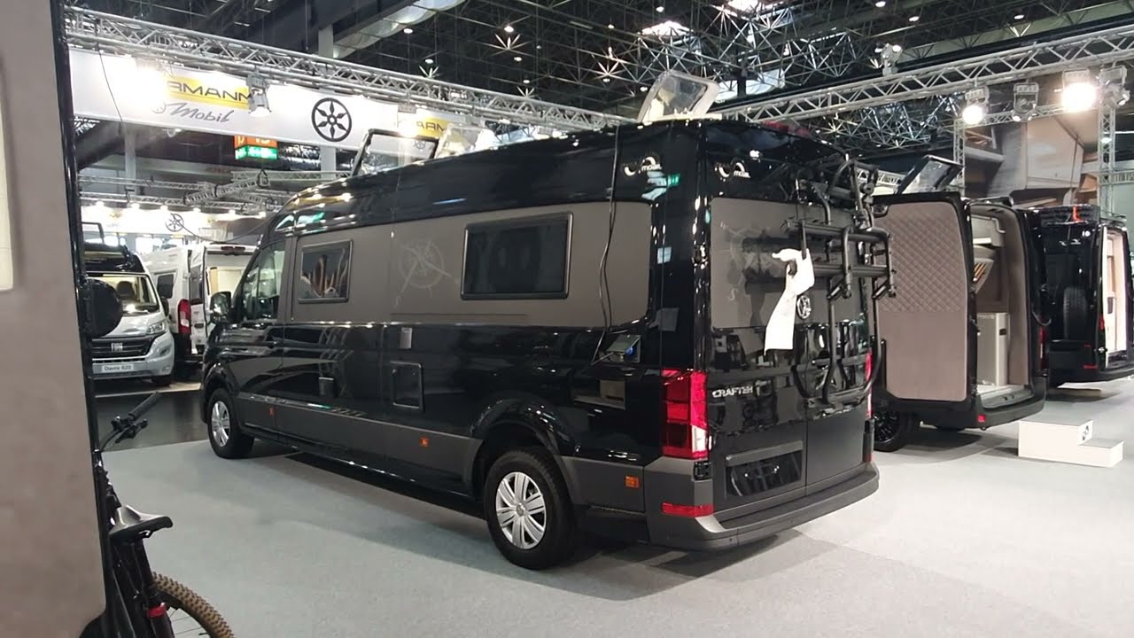 VW campervan with storage for motorbike. MegaMobil Reactiv 680