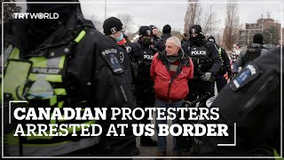 Canada police arrest protesters blocking key bridge
