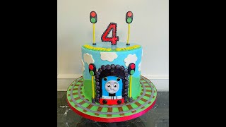 Thomas the Train Fondant Cake Tutorial. Learn how to make a Sculpted Thomas the Train out of Fondant