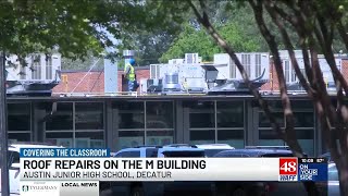Emergency roof repairs underway at Austin Junior High after moisture found