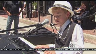 Robi On The Road: Faneuil Hall’s 12-Year-Old ‘Piano Man’