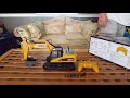 huina 1550 15 channel 2.4ghz remote control rc excavator unboxing setup u0026 review