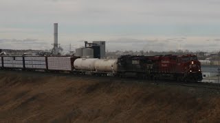 NS 9668 on CP 498!! CP 9357 Leads CP 498 (Manifest) East at Glenmore,Calgary AB. CP Brooks Sub