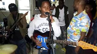 Ndomeo playing dawa song live on stage