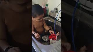 പണിയെടുത്ത് മടുത്തു 😂 #baby #babyboy #kitchenfun #babylove #babyshorts #funny #youtubeshorts