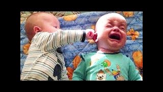 Funny baby Siblings Playing Together