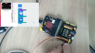 Programming your micro:bit to switch image when a Digital Push Button is pressed.
