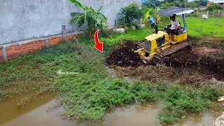 Perfectly action!! Power dozer move dirt trash into water to fill stone develop land with dump truck