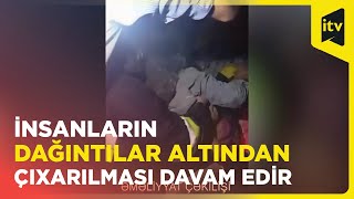 FHN Biləsuvarda partlayış baş verən binanın dağıntıları altında qalan insanları çıxarır