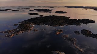 Mirror reflections at sunrise in Rosala Archipelago, Finland