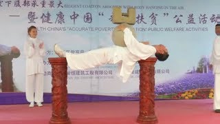 Tai chi master creates world record for carrying heaviest load on gut
