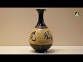 antique appreciation black background and yellow glazed pear shaped vase national museum of china