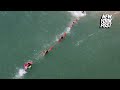 Florida lifeguards form human chain to rescue boogie boarder from deadly rip current: video