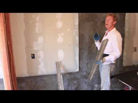 Plaster rendering over interior concrete and drywall Plaster rendering over interior concrete and drywall