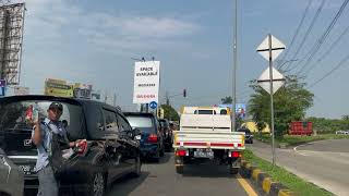 Keluar Gerbang Tol Cikupa. Jalan Tol Tangerang - Merak. Cikupa, Tangerang, 2023.