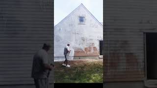 Pressure washing a house with a foam cannon