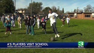 A's players visit children at Arden-Arcade school