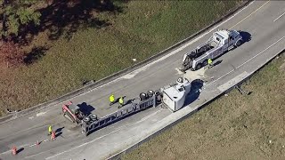 Tractor trailer rollover wreck shuts down I-285 East to I-75 North ramp