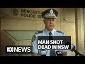 Man shot dead by police after allegedly threatening them with an axe | ABC News