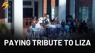 Ribbon-cutting for ‘Liza’s Library’ filled with laughter, love